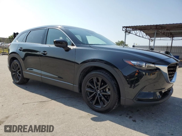 2023 Mazda CX-9 Touring Plus with VIN JM3TCBAY3P0657042, listed as a Copart auction lot 56391575 with 49,780 mi miles and Clean title. Bid and sale history available at DreamBid. Image 4.