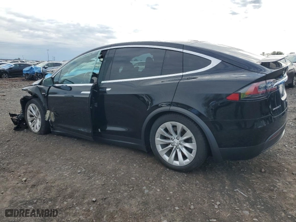 2018 Tesla Model X 75D with VIN 5YJXCAE29JF111980, listed as a Copart auction lot 51465695 with 0 mi miles and Salvage Title. Bid and sale history available at carsss.com. Image 2.