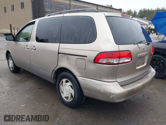 2003 Toyota Sienna LE with VIN 4T3ZF13C93U534860, listed as a IAAI auction lot 41800054 with 214,414 mi miles. Bid and sale history available at carsss.com. Image 3.