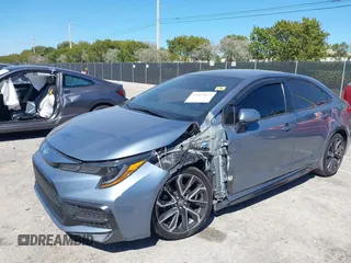 2021 Toyota Corolla SE with VIN JTDS4MCE1MJ063524, listed as a IAAI auction lot 41822622 with 50,882 mi miles. Bid and sale history available at carsss.com. Image 6.