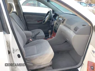 2004 Toyota Corolla CE with VIN JTDBR32E042025208, listed as a IAAI auction lot 41934485 with 299,999 mi miles. Bid and sale history available at carsss.com. Image 5.