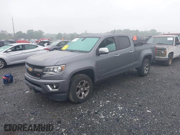 2018 Chevrolet Colorado 4WD Z71 with VIN 1GCGTDEN3J1327344, listed as a IAAI auction lot 42471944 with 153,499 mi miles and . Bid and sale history available at DreamBid. Image 17.