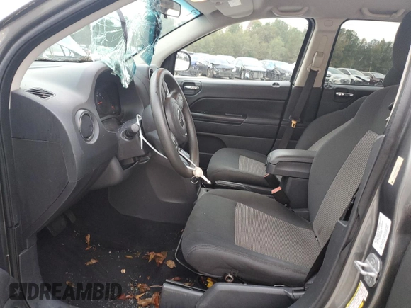 2012 Jeep Compass Sport with VIN 1C4NJDBB3CD522725, listed as a Copart auction lot 79387244 with 134,814 mi miles and Salvage Title. Bid and sale history available at carsss.com. Image 7.