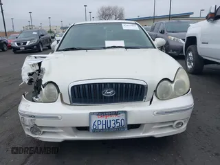 2004 Hyundai Sonata GLS with VIN KMHWF35H64A946091, listed as a IAAI auction lot 41871059 with 150,658 mi miles. Bid and sale history available at carsss.com. Image 13.