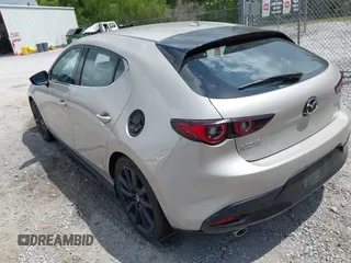2022 Mazda Mazda3 Hatchback Premium with VIN JM1BPAML5N1507556, listed as a IAAI auction lot 42087802 with 56,507 mi miles. Bid and sale history available at carsss.com. Image 3.