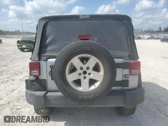 2015 Jeep Wrangler Sport with VIN 1C4AJWAG1FL745444, listed as a Copart auction lot 54062935 with 175,998 mi miles and Salvage Title. Bid and sale history available at carsss.com. Image 6.