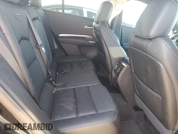 2022 Cadillac XT4 FWD Luxury with VIN 1GYAZAR45NF136810, listed as a Copart auction lot 74359664 with 10,552 mi miles and Salvage title. Bid and sale history available at DreamBid. Image 10.