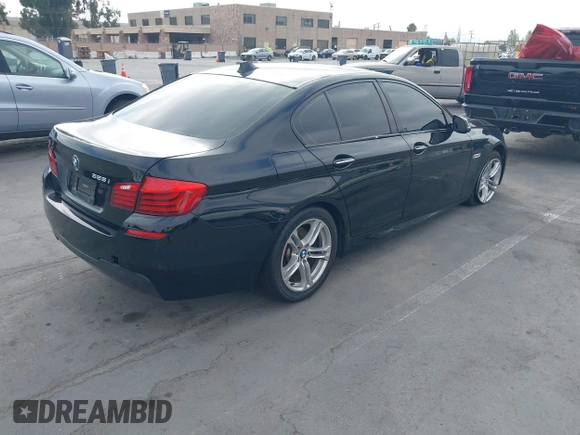 2014 BMW 5 Series 528i with VIN WBA5A5C56ED507960, listed as a IAAI auction lot 42666923 with 110,499 mi miles and . Bid and sale history available at DreamBid. Image 4.