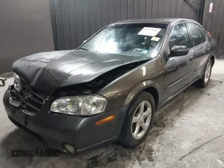 2001 Nissan Maxima SE with VIN JN1CA31A91T112866, listed as a IAAI auction lot 42372546 with 156,069 mi miles and . Bid and sale history available at DreamBid. Image 2.