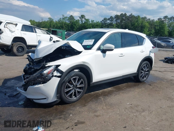 2018 Mazda CX-5 Grand Touring с VIN JM3KFBDM4J0414925, выставлен на аукционе IAAI как лот 42212109 с пробегом 86 826 миль миль и . История ставок и продаж доступна на DreamBid. Изображение 17.