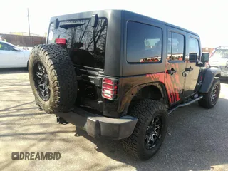 2018 Jeep Wrangler Unlimited Sport S with VIN 1C4BJWDGXJL811661, listed as a IAAI auction lot 42002611 with 86,105 mi miles and . Bid and sale history available at DreamBid. Image 4.