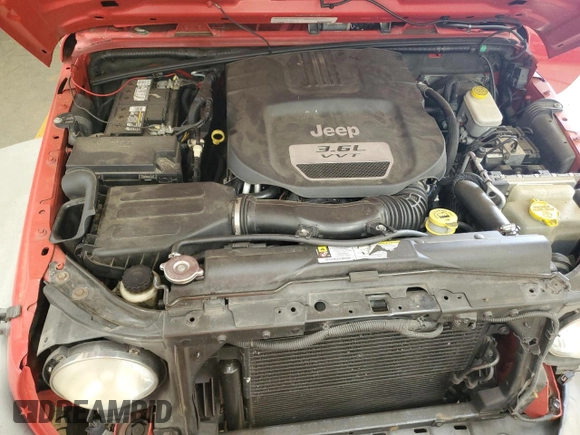 2012 Jeep Wrangler Unlimited Sport z VIN 1C4BJWDG2CL171531, wystawiony jako Copart lot #62181805 z przebiegiem 195 394 mil mil oraz Szkoda całkowita • Salvage title. Historia ofert i sprzedaży dostępna na DreamBid. Obrazek 12.