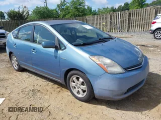 2007 Toyota Prius z VIN JTDKB20U477660027, wystawiony jako IAAI lot #42543373 z przebiegiem 296 279 mil mil oraz . Historia ofert i sprzedaży dostępna na DreamBid. Obrazek 1.