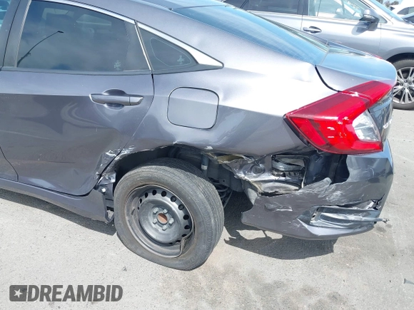 2017 Honda Civic LX with VIN 2HGFC2F52HH566363, listed as a IAAI auction lot 41934807 with 94,063 mi miles and . Bid and sale history available at DreamBid. Image 6.