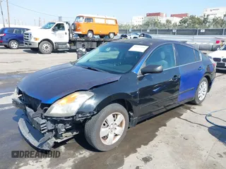 2007 Nissan Altima 2.5 with VIN 1N4AL21E57N429557, listed as a IAAI auction lot 41621114 with 173,525 mi miles. Bid and sale history available at carsss.com. Image 2.