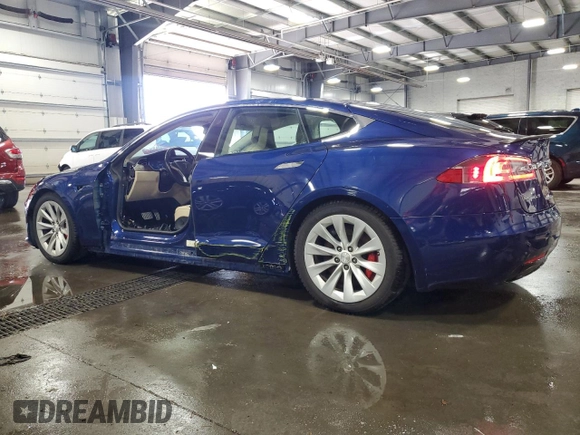 2016 Tesla Model S 90D z VIN 5YJSA1E40GF172712, wystawiony jako Copart lot #63698725 z przebiegiem 99 405 mil mil oraz Szkoda całkowita • Salvage title. Historia ofert i sprzedaży dostępna na DreamBid. Obrazek 2.