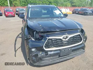 2023 Toyota Highlander L with VIN 5TDKDRBHXPS030361, listed as a IAAI auction lot 42230419 with 59,404 mi miles and . Bid and sale history available at DreamBid. Image 17.