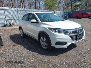 2021 Honda HR-V LX with VIN 3CZRU5H3XMM734889, listed as a IAAI auction lot 41810771 with 53,090 mi miles. Bid and sale history available at carsss.com. Image 1.