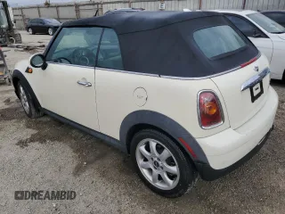 2010 MINI Convertible with VIN WMWMR3C52ATU96951, listed as a Copart auction lot 82038804 with 120,199 mi miles and Clean Title. Bid and sale history available at DreamBid. Image 2.