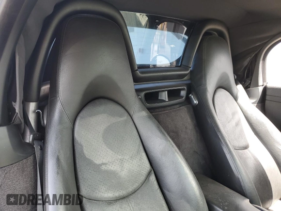 2008 Porsche Boxster S с VIN WP0CB29808U731253, выставлен на аукционе Copart как лот 49583214 с пробегом Не указан миль и Списание • Salvage title. История ставок и продаж доступна на DreamBid. Изображение 10.