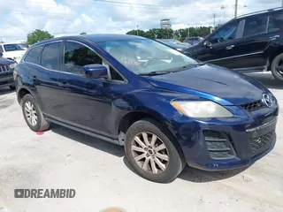 2010 Mazda CX-7 Sport with VIN JM3ER2W5XA0301457, listed as a IAAI auction lot 42257772 with 229,697 mi miles and . Bid and sale history available at DreamBid. Image 1.