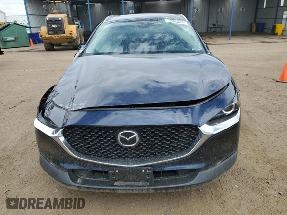 2022 Mazda CX-30 2.5 Turbo with VIN 3MVDMBAYXNM417439, listed as a Copart auction lot 57280884 with 13,590 mi miles and Salvage Title. Bid and sale history available at DreamBid. Image 5.
