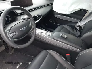 2023 Genesis GV70 2.5T with VIN KMUMADTB1PU079293, listed as a IAAI auction lot 42263714 with 20,323 mi miles and . Bid and sale history available at DreamBid. Image 5.