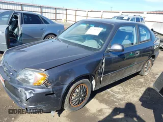 2005 Hyundai Accent GLS with VIN KMHCG35C95U365902, listed as a IAAI auction lot 41715161 with 149,766 mi miles. Bid and sale history available at carsss.com. Image 2.