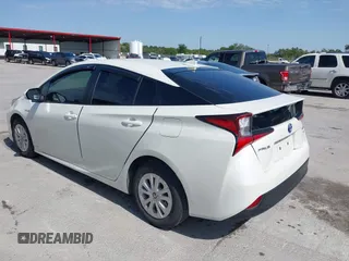 2020 Toyota Prius L Eco z VIN JTDKARFU8L3126291, wystawiony jako IAAI lot #42190242 z przebiegiem 60 404 mil mil oraz . Historia ofert i sprzedaży dostępna na DreamBid. Obrazek 3.