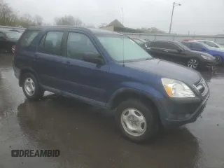 2004 Honda CR-V LX with VIN SHSRD78474U252663, listed as a Copart auction lot 52090185 with 202,703 mi miles and Salvage Title. Bid and sale history available at carsss.com. Image 4.