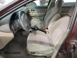 2001 Ford Taurus SES with VIN 1FAFP55S61G184193, listed as a Copart auction lot 49190475 with 129,415 mi miles and Salvage Title. Bid and sale history available at DreamBid. Image 7.