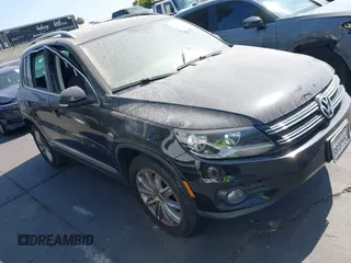 2015 Volkswagen Tiguan SE with VIN WVGAV7AX1FW506934, listed as a IAAI auction lot 42606369 with 96,914 mi miles and . Bid and sale history available at DreamBid. Image 1.