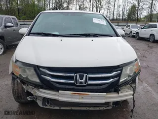 2015 Honda Odyssey Touring Elite with VIN 5FNRL5H98FB076428, listed as a IAAI auction lot 41998339 with 114,573 mi miles. Bid and sale history available at carsss.com. Image 6.
