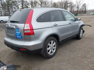 2007 Honda CR-V EX-L with VIN 5J6RE48757L017428, listed as a IAAI auction lot 41784403 with 131,388 mi miles. Bid and sale history available at carsss.com. Image 4.