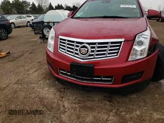2014 Cadillac SRX Luxury Collection z VIN 3GYFNBE30ES560380, wystawiony jako Copart lot #53472775 z przebiegiem 110 019 mil mil oraz Szkoda całkowita • Salvage title. Historia ofert i sprzedaży dostępna na DreamBid. Obrazek 13.