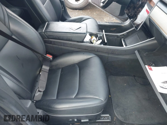 2019 Tesla Model 3 Mid Range with VIN 5YJ3E1EA3KF426971, listed as a IAAI auction lot 41564939 with Not Provided miles and . Bid and sale history available at carsss.com. Image 5.