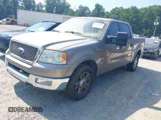 2005 Ford F-150 XLT with VIN 1FTPW125X5KD57371, listed as a IAAI auction lot 42560217 with 166,441 mi miles and . Bid and sale history available at DreamBid. Image 2.