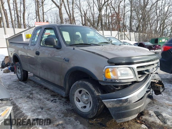 2003 Ford F-150 XL with VIN 2FTRX18W73CB07559, listed as a IAAI auction lot 41452402 with 152,509 mi miles. Bid and sale history available at carsss.com. Image 1.