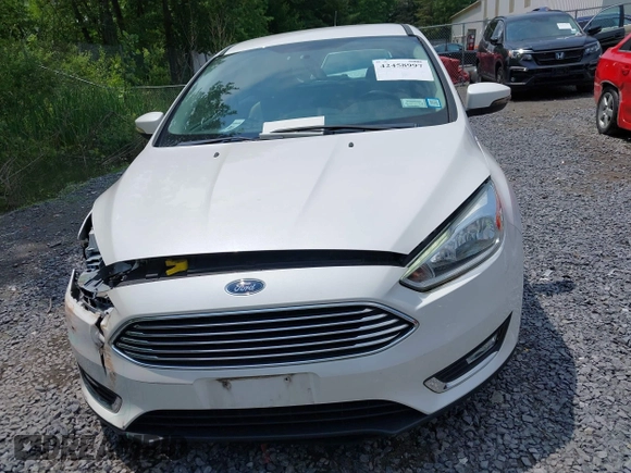 2016 Ford Focus Titanium with VIN 1FADP3N26GL332709, listed as a IAAI auction lot 42458997 with 75,509 mi miles and . Bid and sale history available at DreamBid. Image 12.