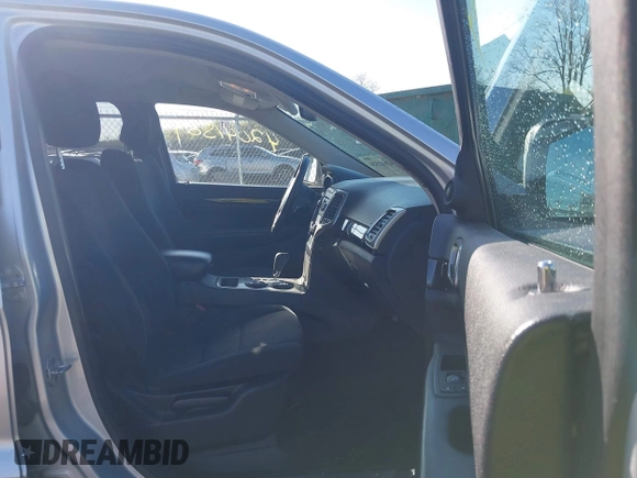 2013 Jeep Grand Cherokee Laredo with VIN 1C4RJFAG3DC586667, listed as a IAAI auction lot 42041524 with 100,635 mi miles. Bid and sale history available at carsss.com. Image 5.