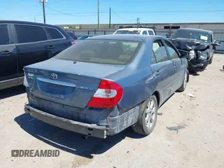 2004 Toyota Camry LE z VIN 4T1BE32K74U915657, wystawiony jako IAAI lot #41837915 z przebiegiem 260 096 mil mil oraz . Historia ofert i sprzedaży dostępna na DreamBid. Obrazek 4.