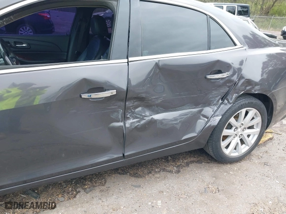 2013 Chevrolet Malibu LTZ with VIN 1G11H5SA5DF267940, listed as a IAAI auction lot 41854067 with 159,946 mi miles. Bid and sale history available at carsss.com. Image 6.