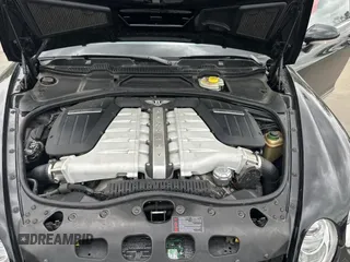 2006 Bentley Continental GT GT with VIN SCBCR63W56C037318, listed as a Copart auction lot 53995755 with 46,990 mi miles and Clean Title. Bid and sale history available at DreamBid. Image 7.
