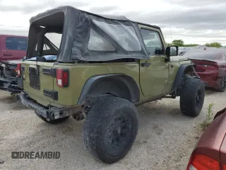 2013 Jeep Wrangler Rubicon z VIN 1C4HJWCG1DL574039, wystawiony jako Copart lot #48728645 z przebiegiem 116 537 mil mil oraz Szkoda całkowita • Salvage title. Historia ofert i sprzedaży dostępna na DreamBid. Obrazek 3.