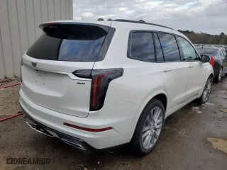 2021 Cadillac XT6 AWD Sport with VIN 1GYKPHRS4MZ209583, listed as a Copart auction lot 66305562 with 19,570 mi miles. Bid and sale history available at carsss.com. Image 4.