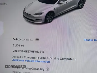 2021 Tesla Model S Long Range with VIN 5YJSA1E57MF453815, listed as a IAAI auction lot 41818700 with 51,176 mi miles and . Bid and sale history available at DreamBid. Image 16.