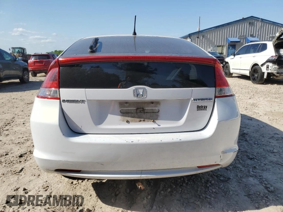 2010 Honda Insight EX z VIN JHMZE2H77AS035113, wystawiony jako Copart lot #54179005 z przebiegiem 165 083 mil mil oraz Szkoda całkowita • Salvage title. Historia ofert i sprzedaży dostępna na DreamBid. Obrazek 6.