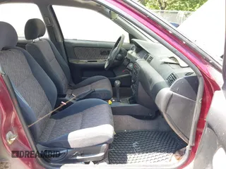 1999 Nissan Sentra XE with VIN 3N1AB41D0XL107458, listed as a IAAI auction lot 42536232 with 119,701 mi miles and . Bid and sale history available at DreamBid. Image 5.