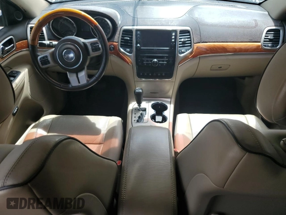 2013 Jeep Grand Cherokee Overland with VIN 1C4RJFCT1DC522850, listed as a Copart auction lot 53919465 with 119,883 mi miles and Clean Title. Bid and sale history available at carsss.com. Image 8.