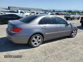 2006 Acura RL z VIN JH4KB16576C005794, wystawiony jako Copart lot #55167965 z przebiegiem 157 104 mil mil oraz Szkoda całkowita • Salvage title. Historia ofert i sprzedaży dostępna na DreamBid. Obrazek 3.